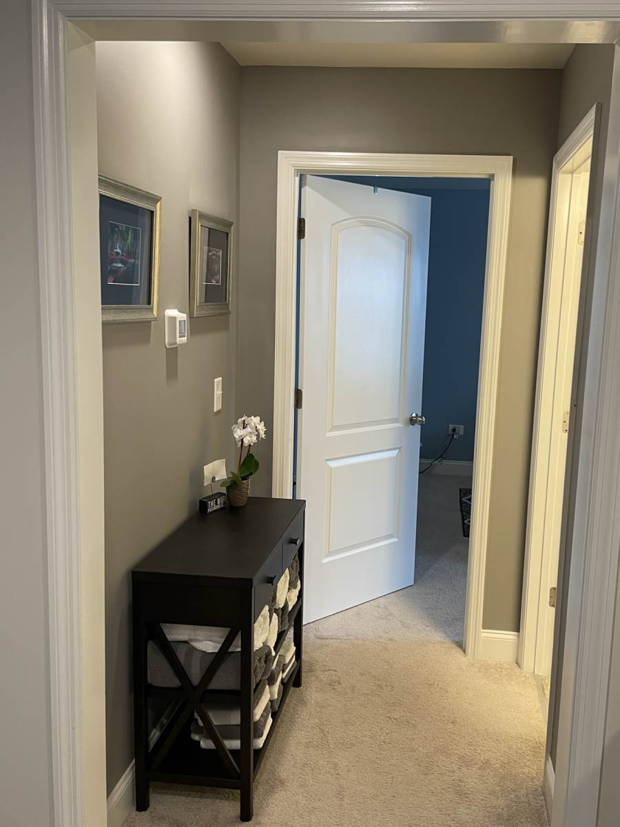 shot of a short hallway painted in Fashion Gray