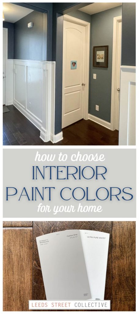a long image with a photo of a navy blue hallway and white doors, in the middle the text reads how to choose interior paint colors for your home, on the bottom a photo of 2 paint chips, one gray and one white laying on a wooden floor