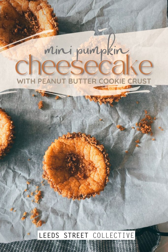 a mini pumpkin cheesecake on a piece of parchment paper with text overlaid